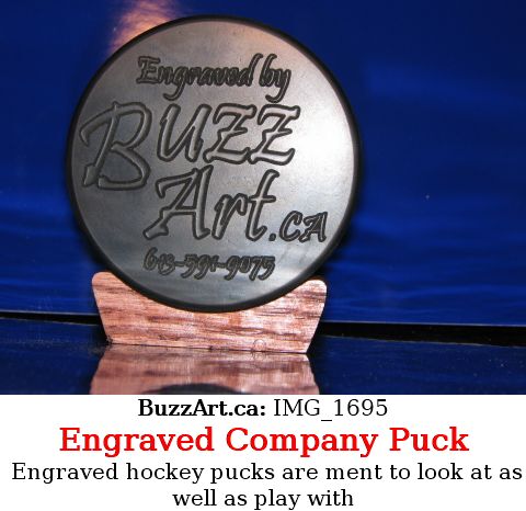 Buzz Art promotional hockey puck